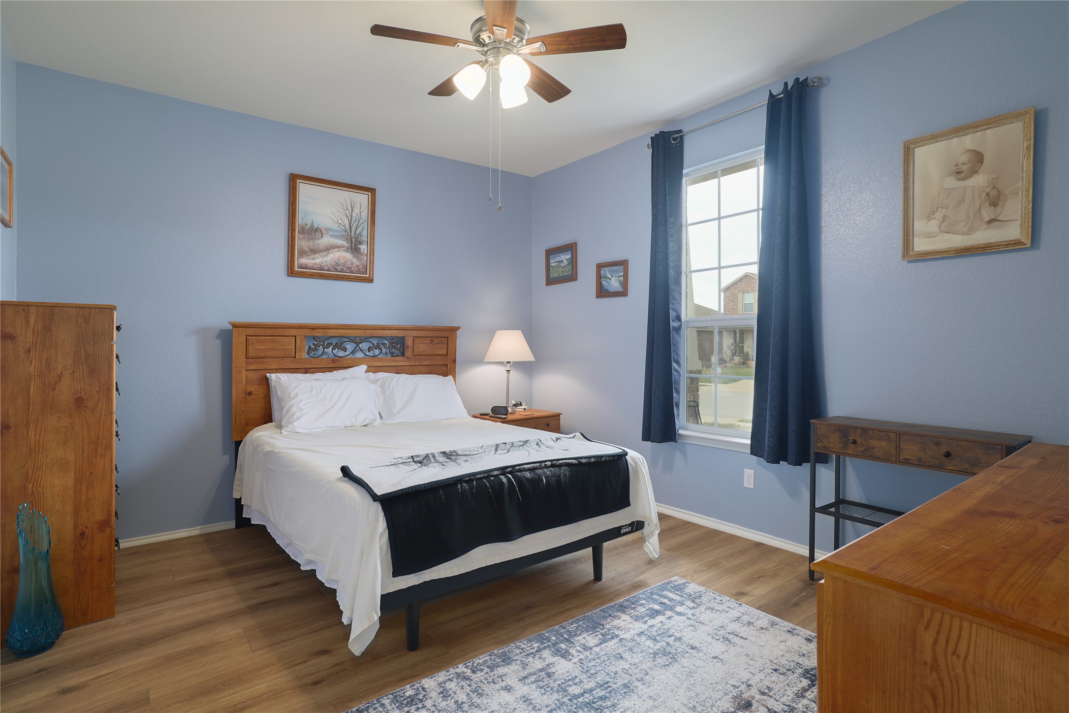 416 Sierra Mar Loop Leander, TX 78641 - Photo 16 of 38 2nd bedroom, seconday primary room with ensuite full bathroom and walk in closet.