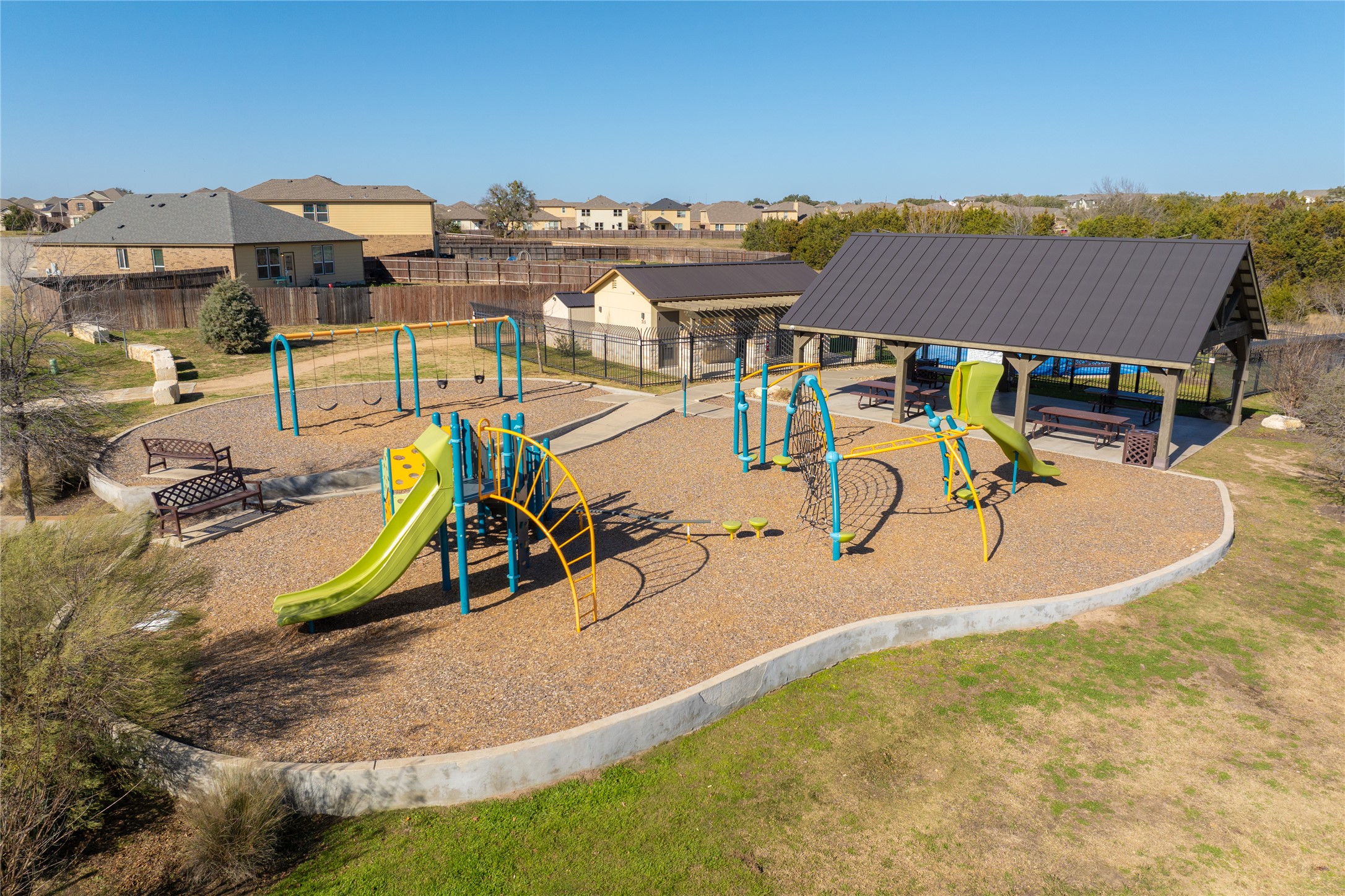 416 Sierra Mar Loop Leander, TX 78641 - Photo 35 of 38 Community play area featuring a patio area and a residential view