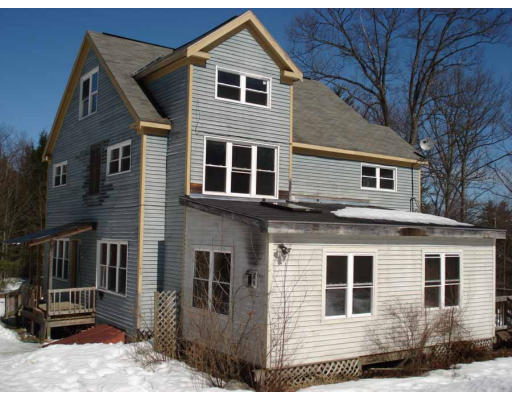315 Gidney Road Orange, MA 01364 - Photo 3 of 14 a front view of a house with a yard
