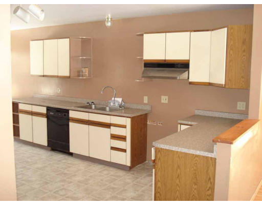 315 Gidney Road Orange, MA 01364 - Photo 4 of 14 a kitchen with a sink cabinets and a window
