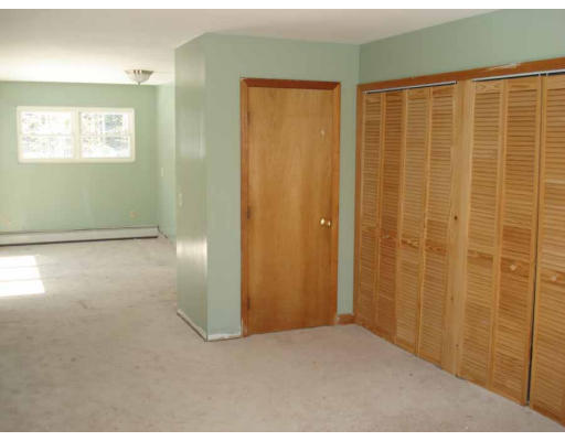 315 Gidney Road Orange, MA 01364 - Photo 8 of 14 a view of an empty room with a window