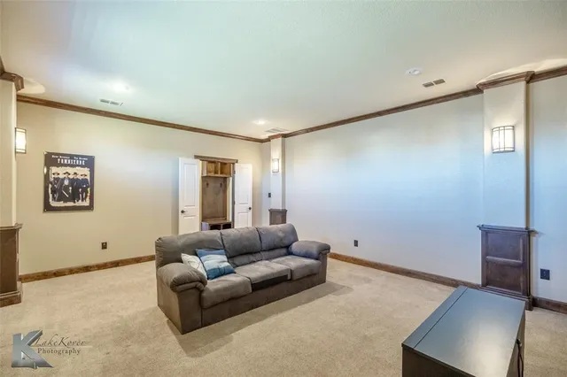 a living room with furniture and a couch