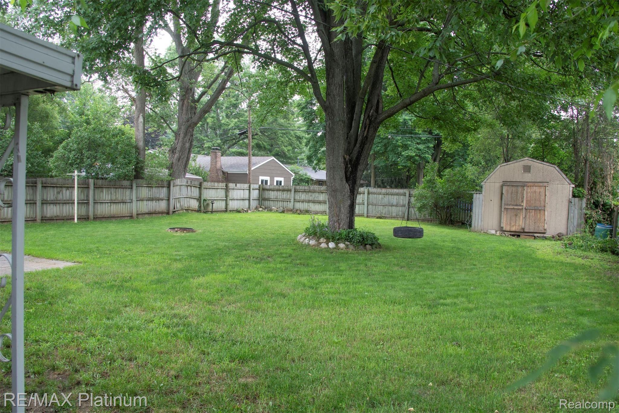 9221 Lee Road Brighton, MI 48116 - Photo 16 of 17 Large back yard