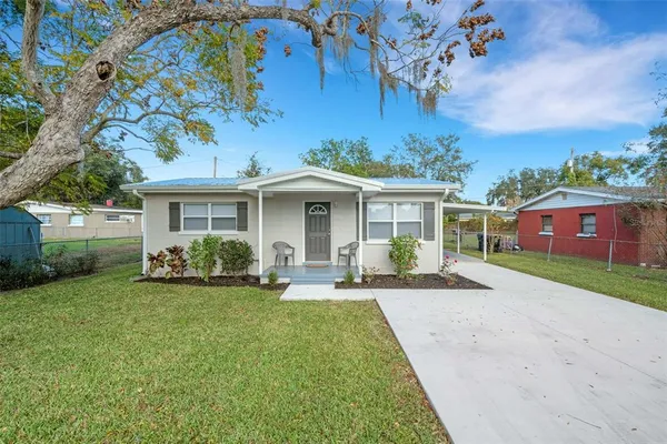 front view of a house with a yard