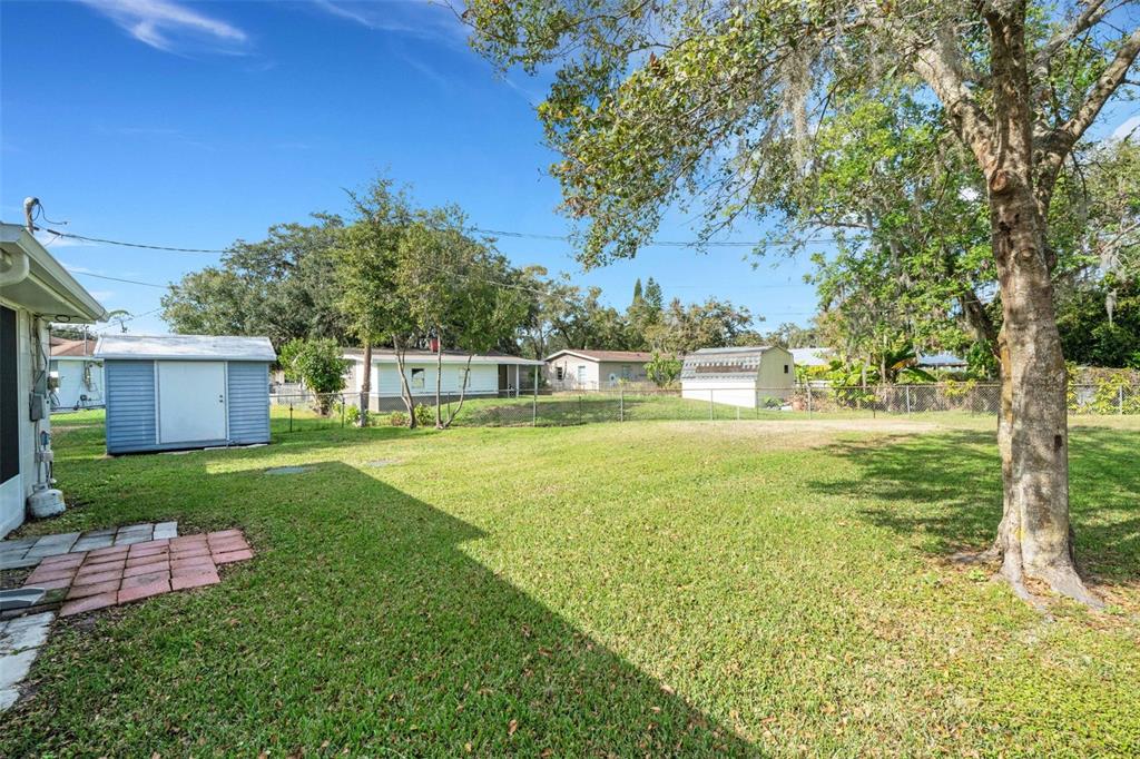 2716 Hardin Combee Road Lakeland, FL 33801 - Photo 27 of 32 a view of a house with a yard