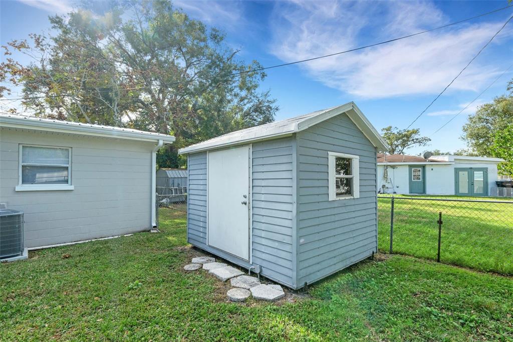 2716 Hardin Combee Road Lakeland, FL 33801 - Photo 28 of 32 a view of a house with a yard