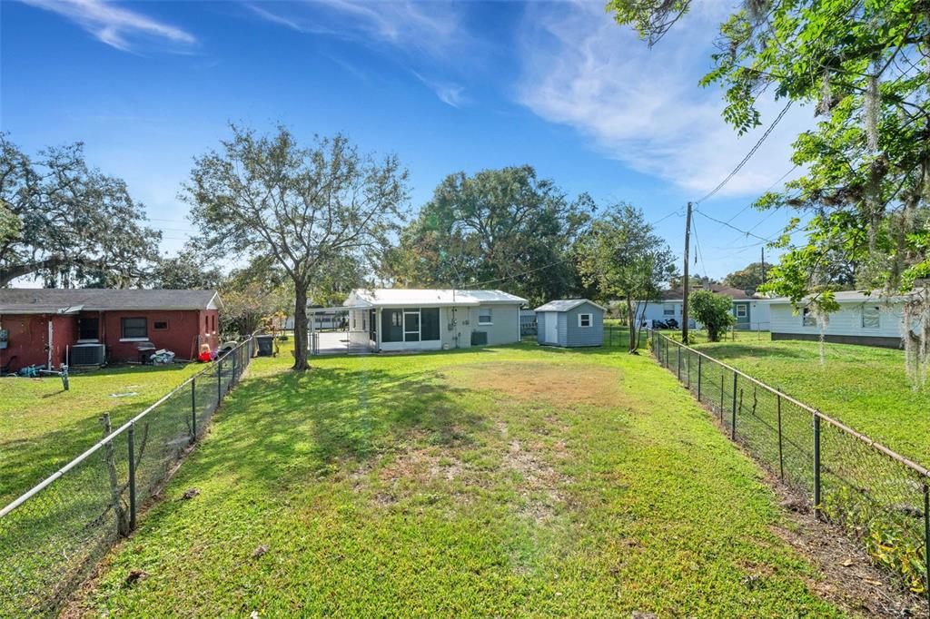2716 Hardin Combee Road Lakeland, FL 33801 - Photo 30 of 32 a view of a house with a yard
