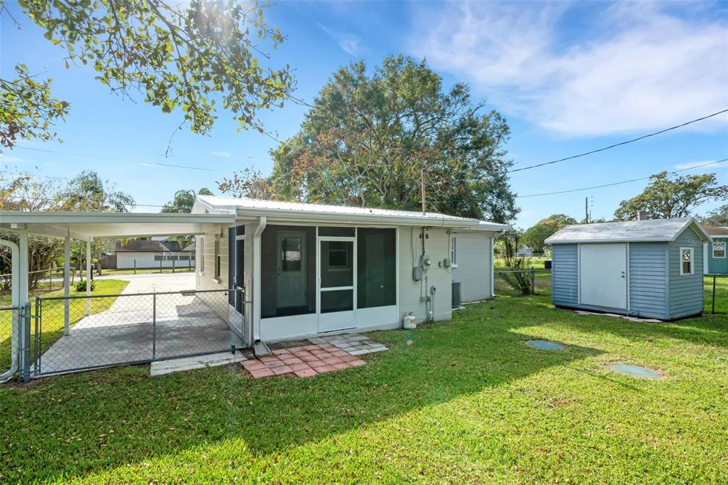 2716 Hardin Combee Road Lakeland, FL 33801 - Photo 31 of 32 a view of a house with a yard and sitting area