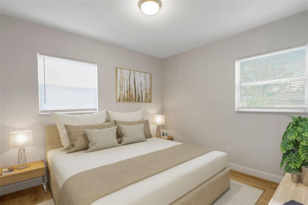 2716 Hardin Combee Road Lakeland, FL 33801 - Photo 7 of 32 a bedroom with a bed and a window