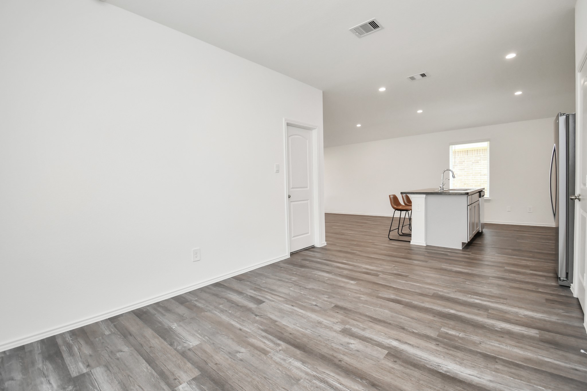 5315 Castlebury Meadows Dr Spring Spring, TX 77373 - Photo 16 of 39 a view of empty room with wooden floor