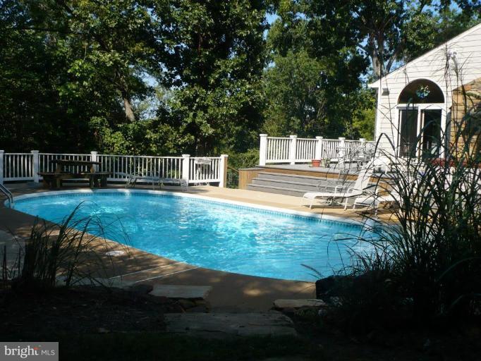 8529 Botha Road Warrenton, VA 20186 - Photo 5 of 30 Entertain & enjoy the pool & hot tub from the deck