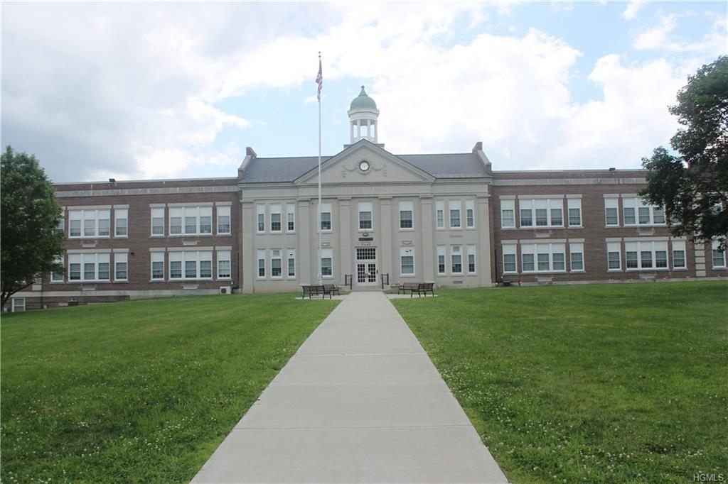 Newry Road Greenville, NY 12083 - Photo 13 of 16 a view of a big house with a big yard and large trees