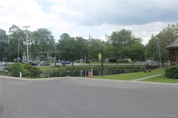 a street sign on a pole on a street