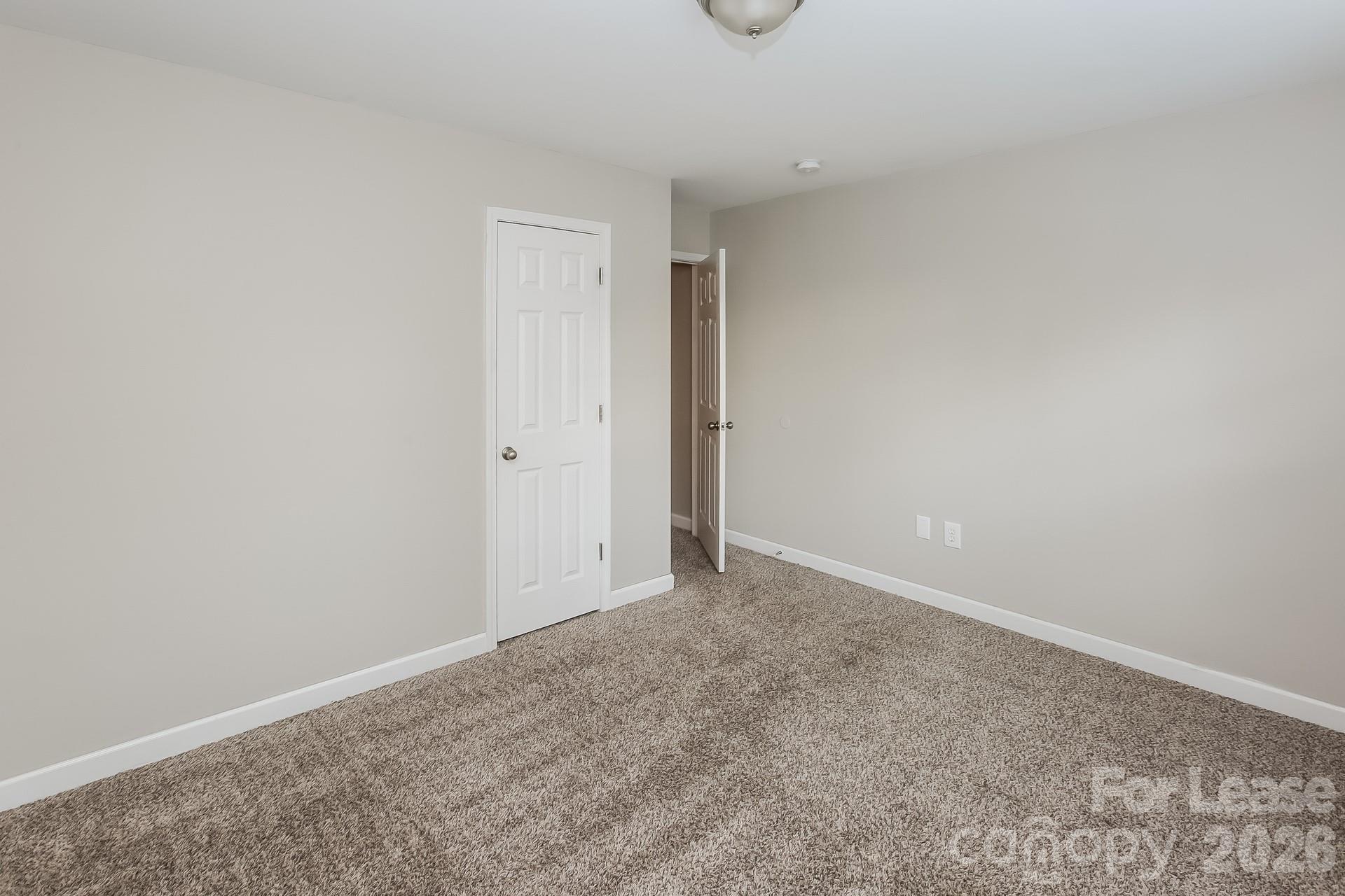 8812 Cornwall Street Locust, NC 28097 - Photo 9 of 15 an empty room with an entryway