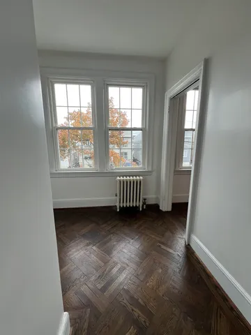 an empty room with windows