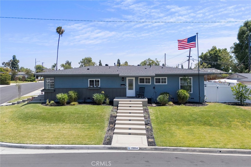 13804 El Espejo Road La Mirada, CA 90638 - Photo 1 of 1 a front view of a house with a yard