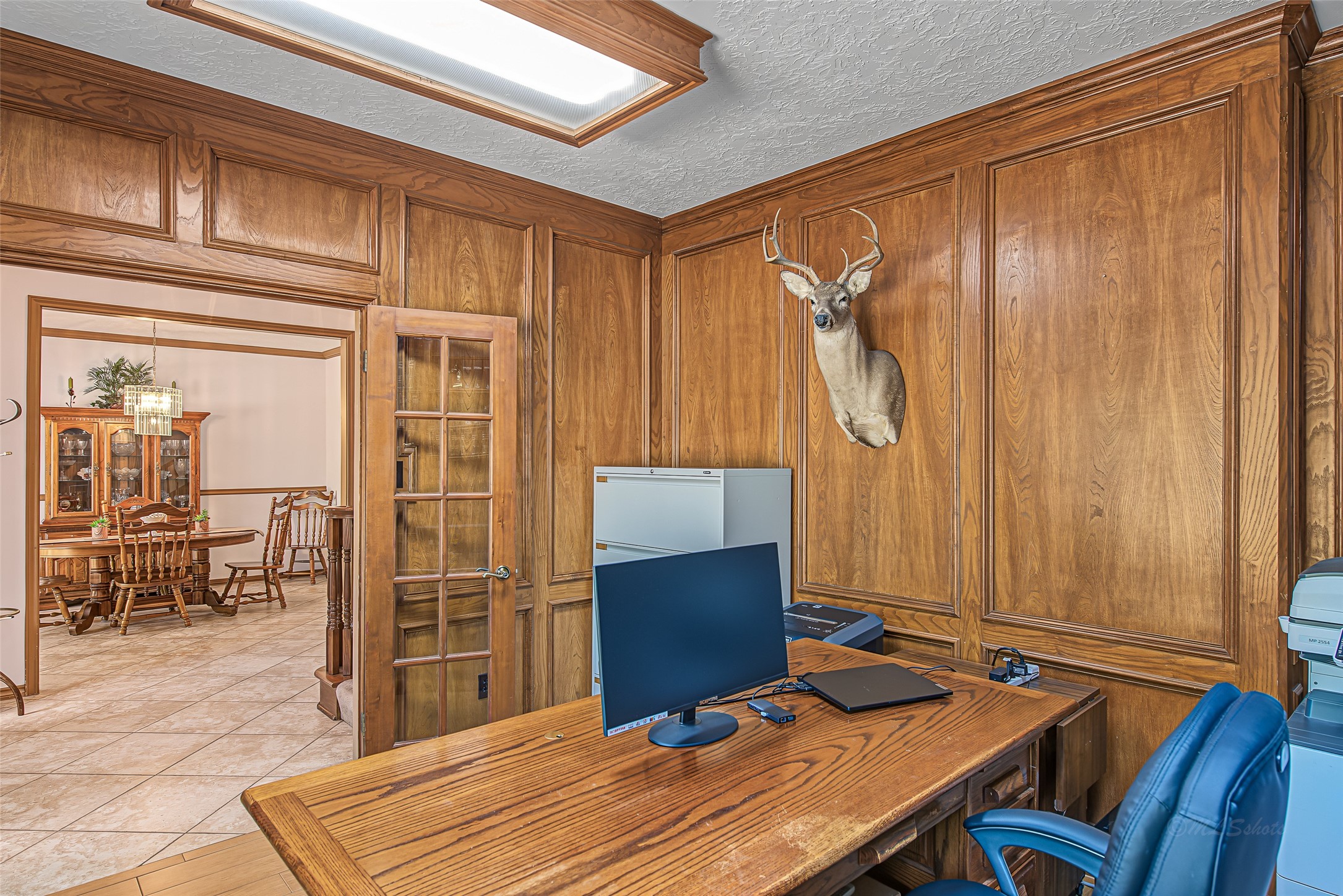 1345 Peach Ridge Road Brookshire, TX 77423 - Photo 11 of 50 Combining classic Texas heritage warmth with double entry French doors, this versatile room offers buyers the perfect blend of luxury, quiet privacy, and turnkey utility for a primary office or personal library.