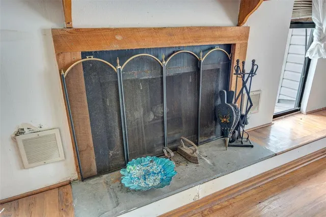 a backyard of a house with lots of trees