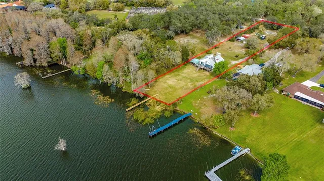a aerial view of a house with swimming pool