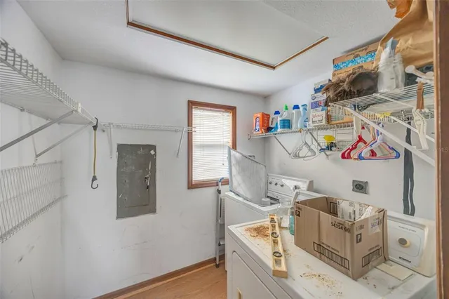 a view of a livingroom with furniture and a fireplace