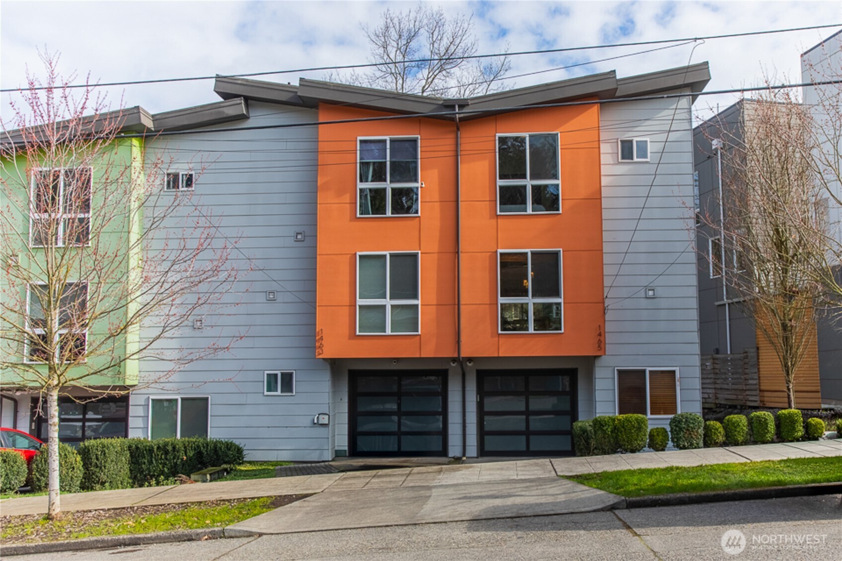 1465 South Columbian Way Seattle, WA 98144 - Photo 2 of 35 a front view of a house with a yard