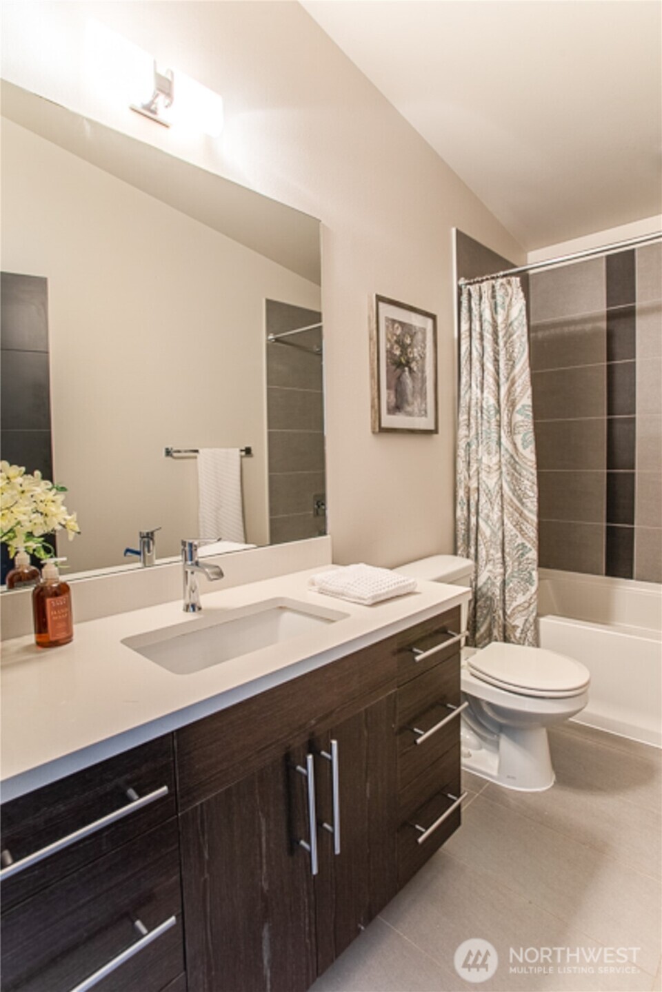 1465 South Columbian Way Seattle, WA 98144 - Photo 25 of 35 a bathroom with a sink a toilet and shower