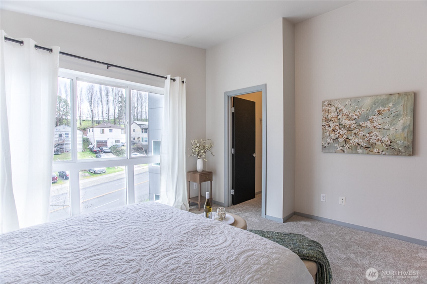 1465 South Columbian Way Seattle, WA 98144 - Photo 27 of 35 a bedroom with a bed and a window