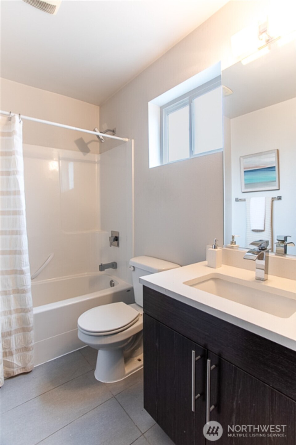 1465 South Columbian Way Seattle, WA 98144 - Photo 33 of 35 a bathroom with a sink a toilet and shower