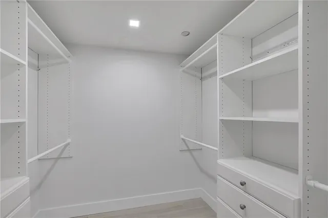 a view of an empty walk in closet