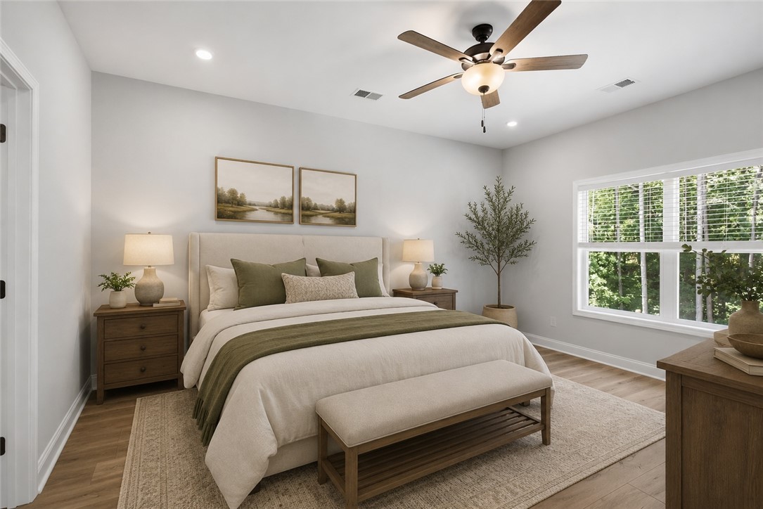 912 Watercrest Road West Union, SC 29696 - Photo 20 of 49 VIRTUALLY STAGED: This primary bedroom offers ample natural light and a serene atmosphere for peaceful relaxation.