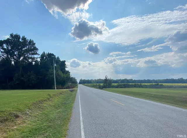 a view of a lake with a big yard