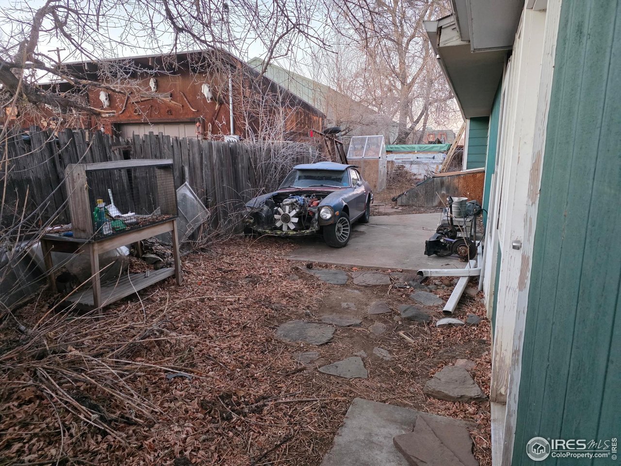 4355 Parfet Street Wheat Ridge, CO 80033 - Photo 15 of 40 a view of a car parked in front of a house
