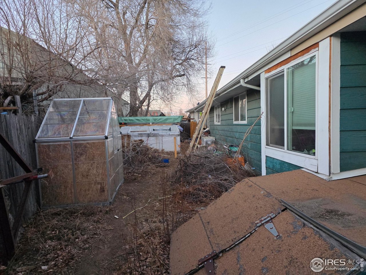 4355 Parfet Street Wheat Ridge, CO 80033 - Photo 16 of 40 a backyard of a house with seating space