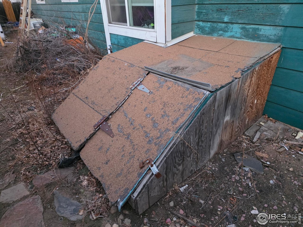 4355 Parfet Street Wheat Ridge, CO 80033 - Photo 19 of 40 a view of a backyard with sitting area