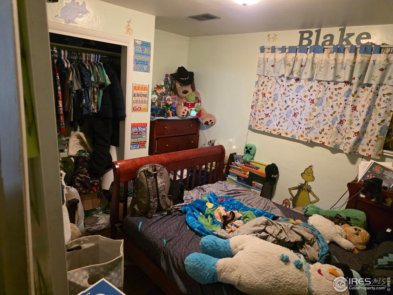 4355 Parfet Street Wheat Ridge, CO 80033 - Photo 27 of 40 a living room with furniture and a couch