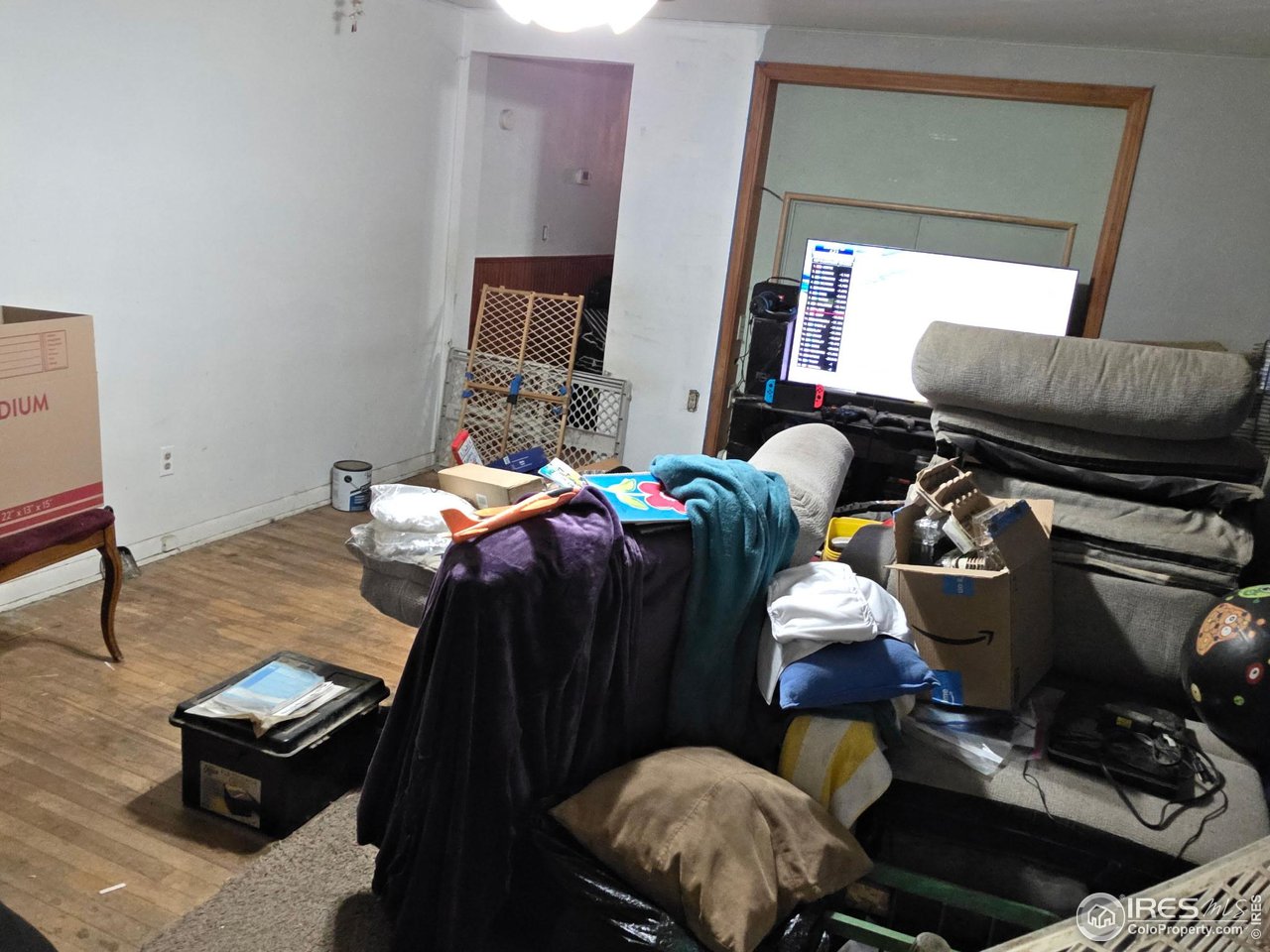 4355 Parfet Street Wheat Ridge, CO 80033 - Photo 33 of 40 a living room with furniture and a couch
