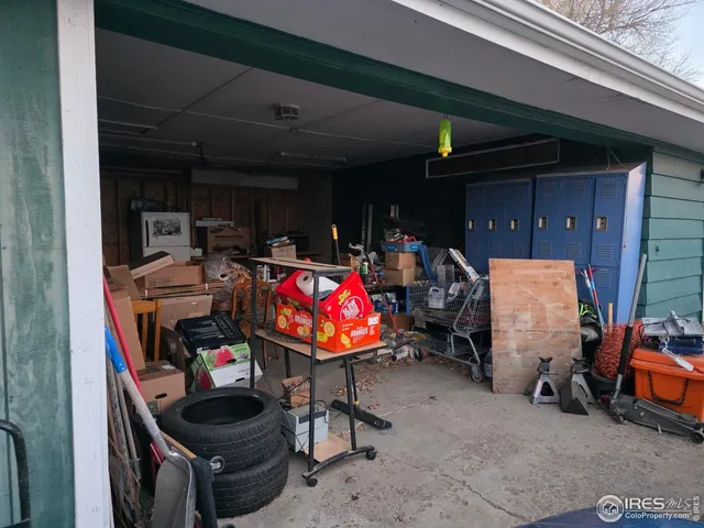 a storage room with furniture and a window