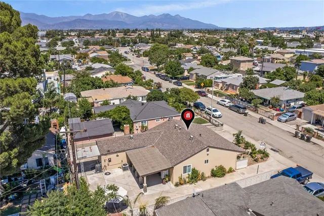 an aerial view of a city with lots of residential buildings