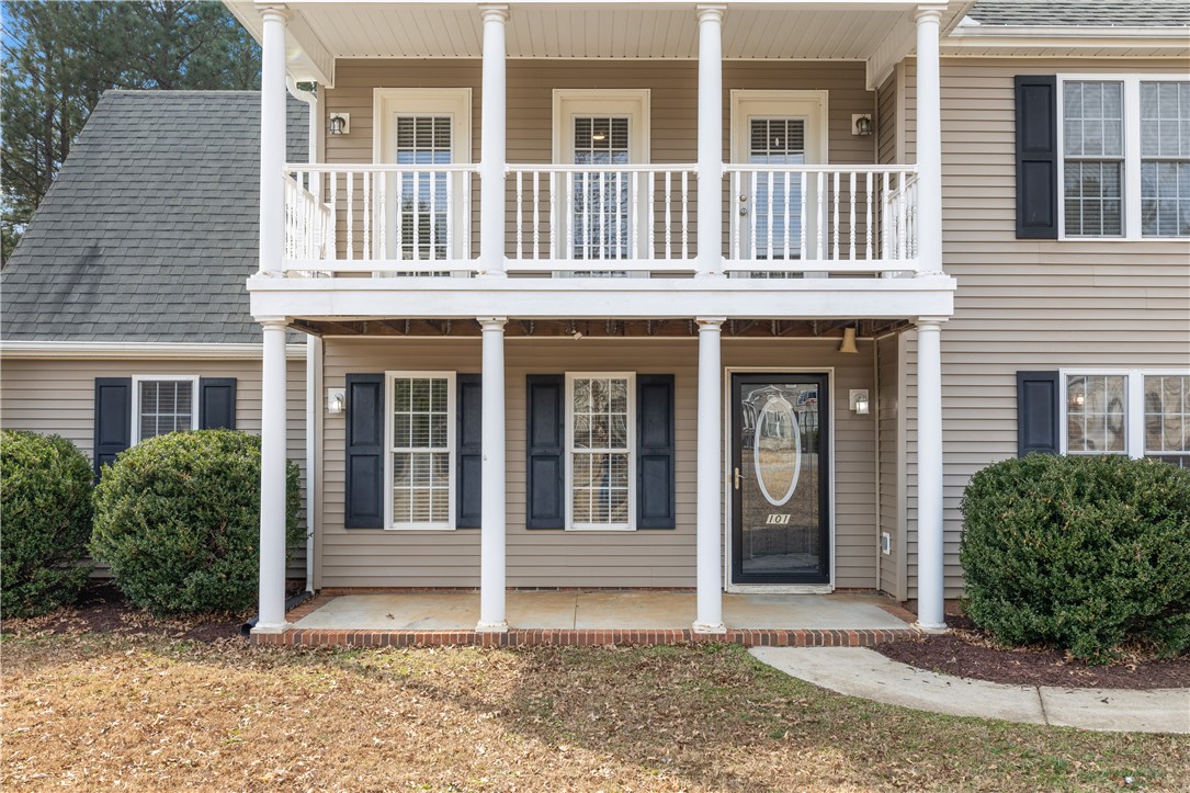 101 Buteos Way Anderson, SC 29621 - Photo 2 of 44 This residence features a welcoming facade with a balcony, classic shutters, and a well-maintained exterior.