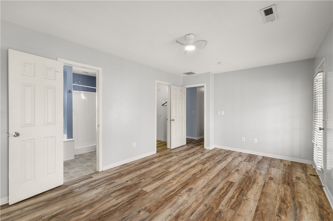 101 Buteos Way Anderson, SC 29621 - Photo 22 of 44 This airy bedroom features durable flooring and convenient access to a private bath.