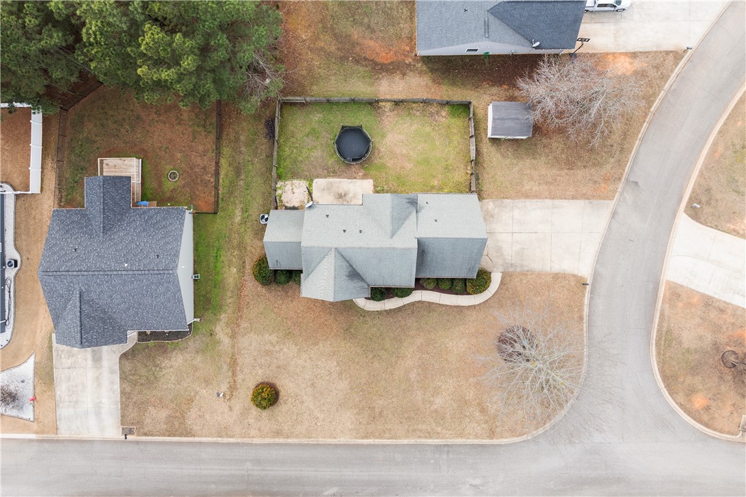 101 Buteos Way Anderson, SC 29621 - Photo 40 of 44 An aerial perspective reveals a well-maintained property with ample yard space and mature trees.