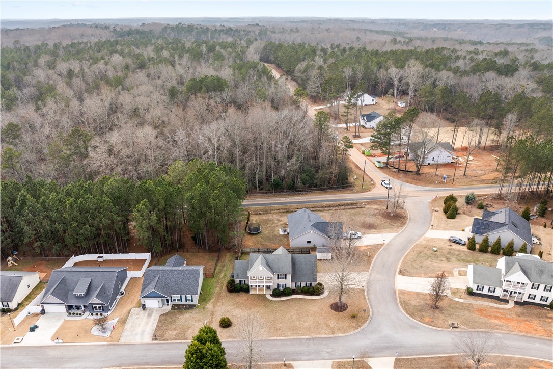 101 Buteos Way Anderson, SC 29621 - Photo 44 of 44 This elevated view showcases a serene residential area bordered by expansive woodlands.