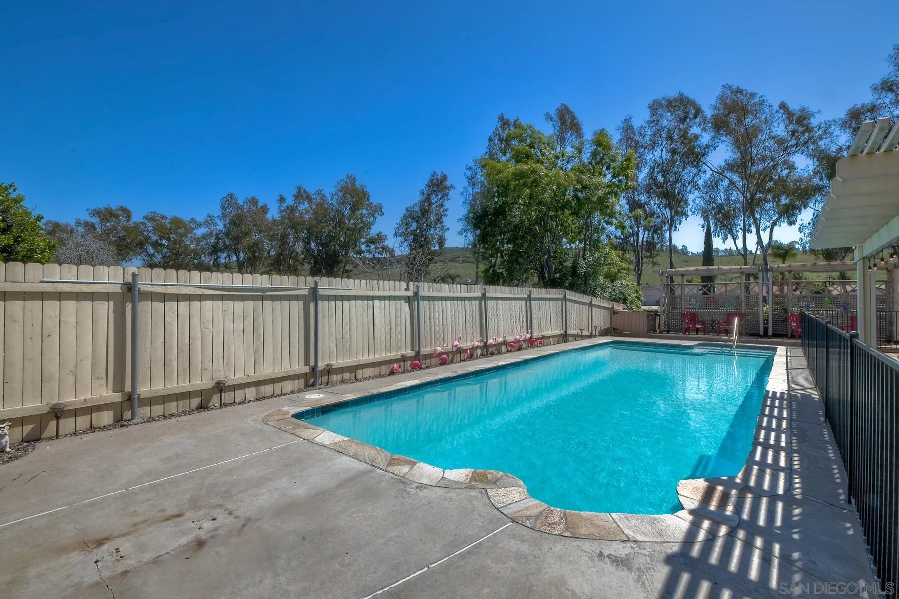12861 Carriage Road Poway, CA 92064 - Photo 38 of 44 a view of a swimming pool with a slide
