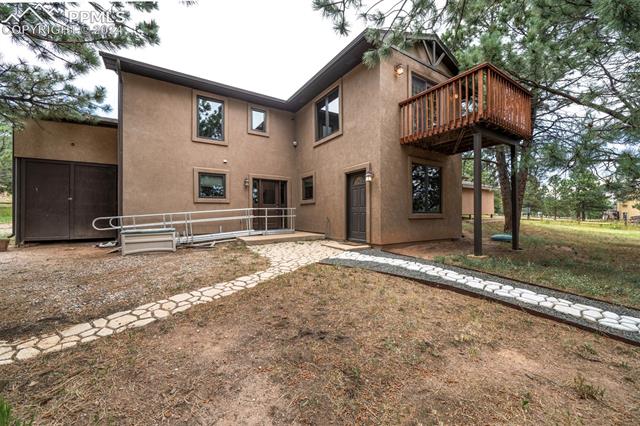 18255 Stoneview Road Monument, CO 80132 - Photo 42 of 42 View of rear of house