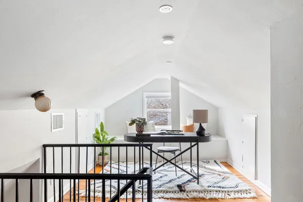 a workspace with furniture and window