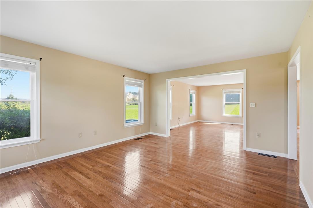 590 Fehr Road Nazareth, PA 18064 - Photo 9 of 79 Gleaming hardwood floors flow throughout the seamless, light-filled open layout.