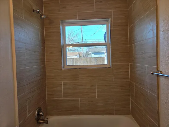 a bathroom with a window