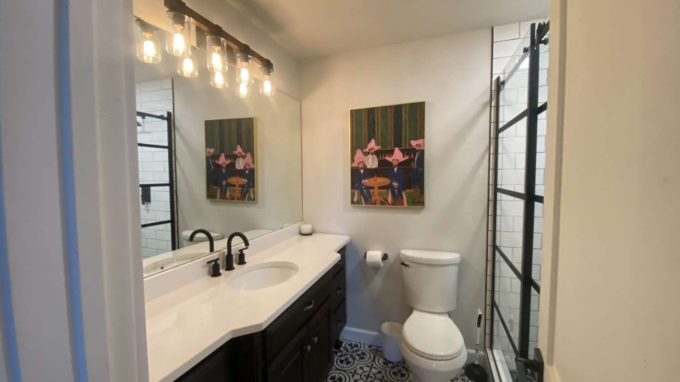 1202 Nix Road Lampasas, TX 76550 - Photo 11 of 20 Full bathroom featuring vanity, a shower stall, and light tile patterned flooring