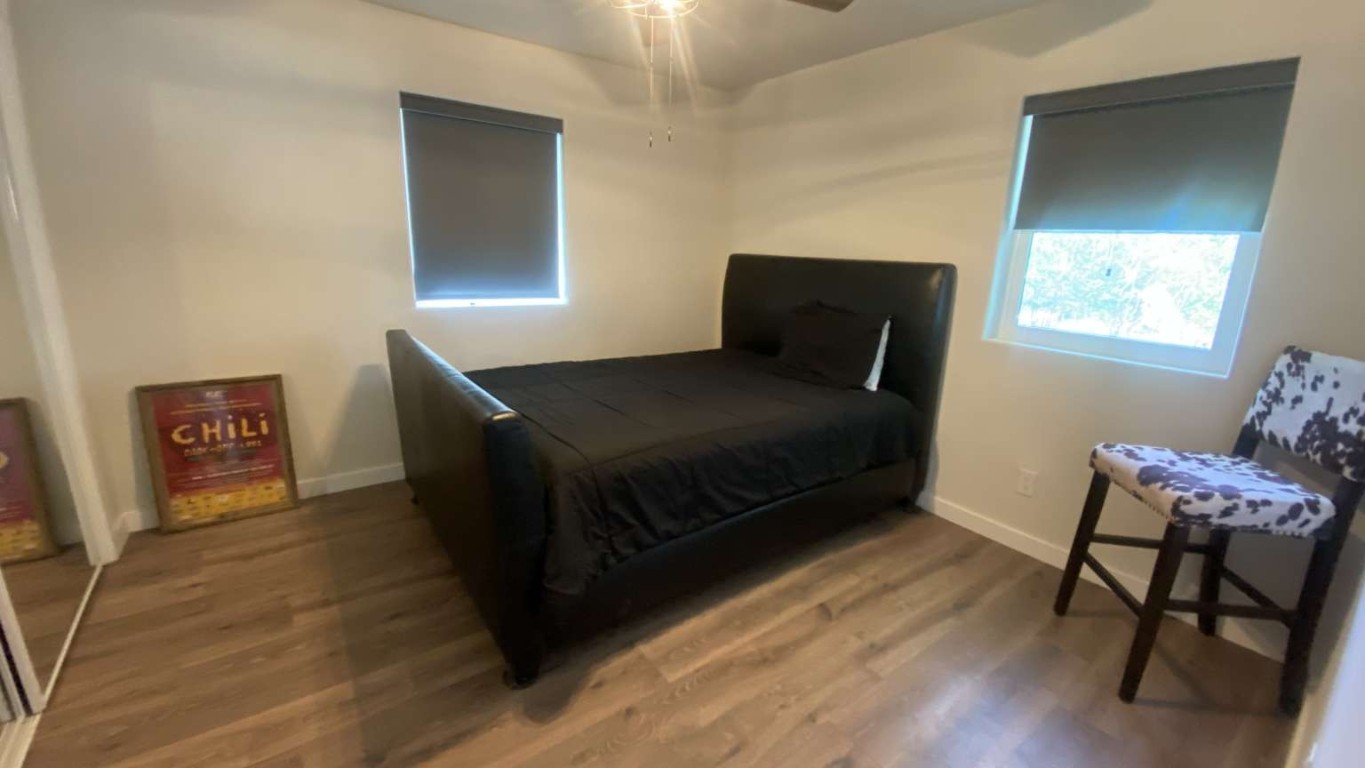1202 Nix Road Lampasas, TX 76550 - Photo 17 of 20 Bedroom featuring wood finished floors and a ceiling fan