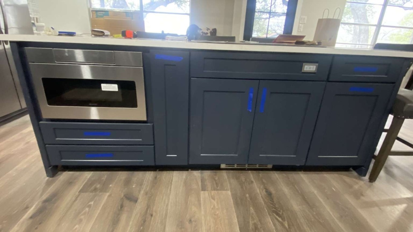 1202 Nix Road Lampasas, TX 76550 - Photo 6 of 20 Kitchen featuring light wood-style floors, light countertops, and stainless steel oven